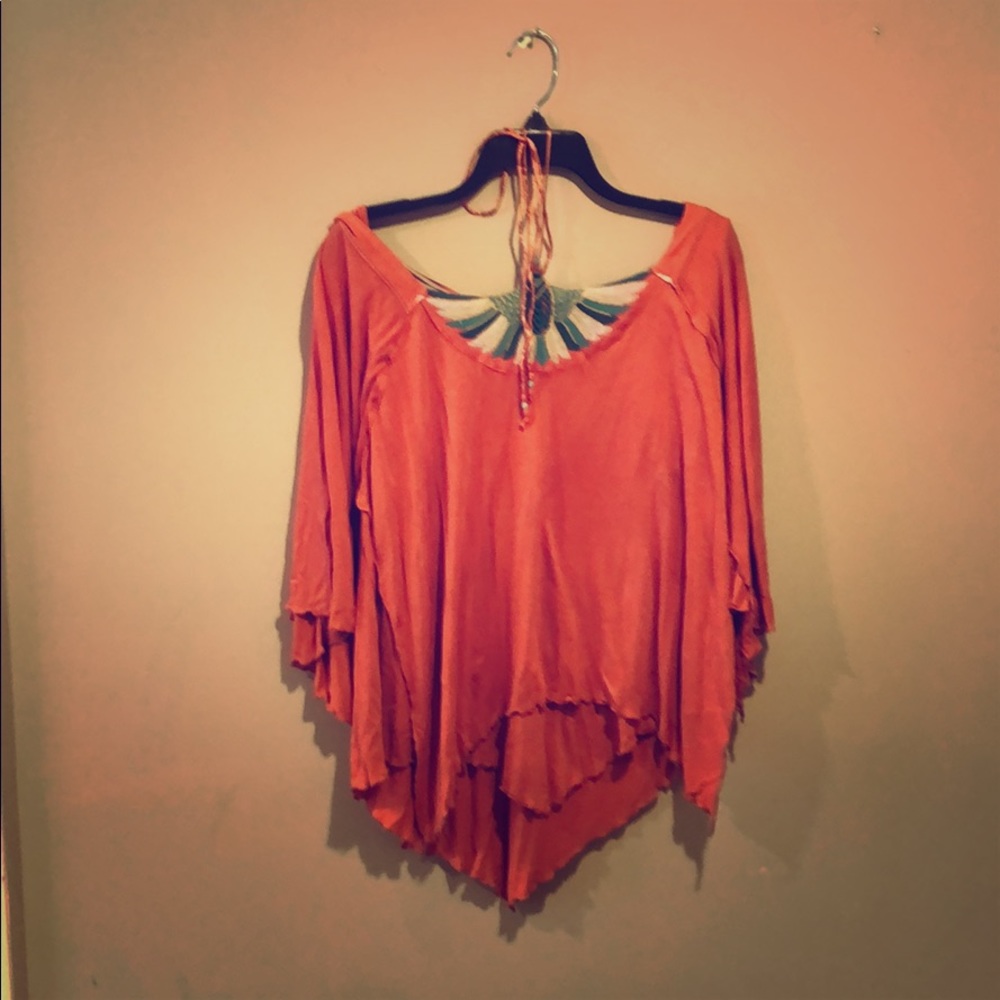 Free people shirt- coral colored blouse.